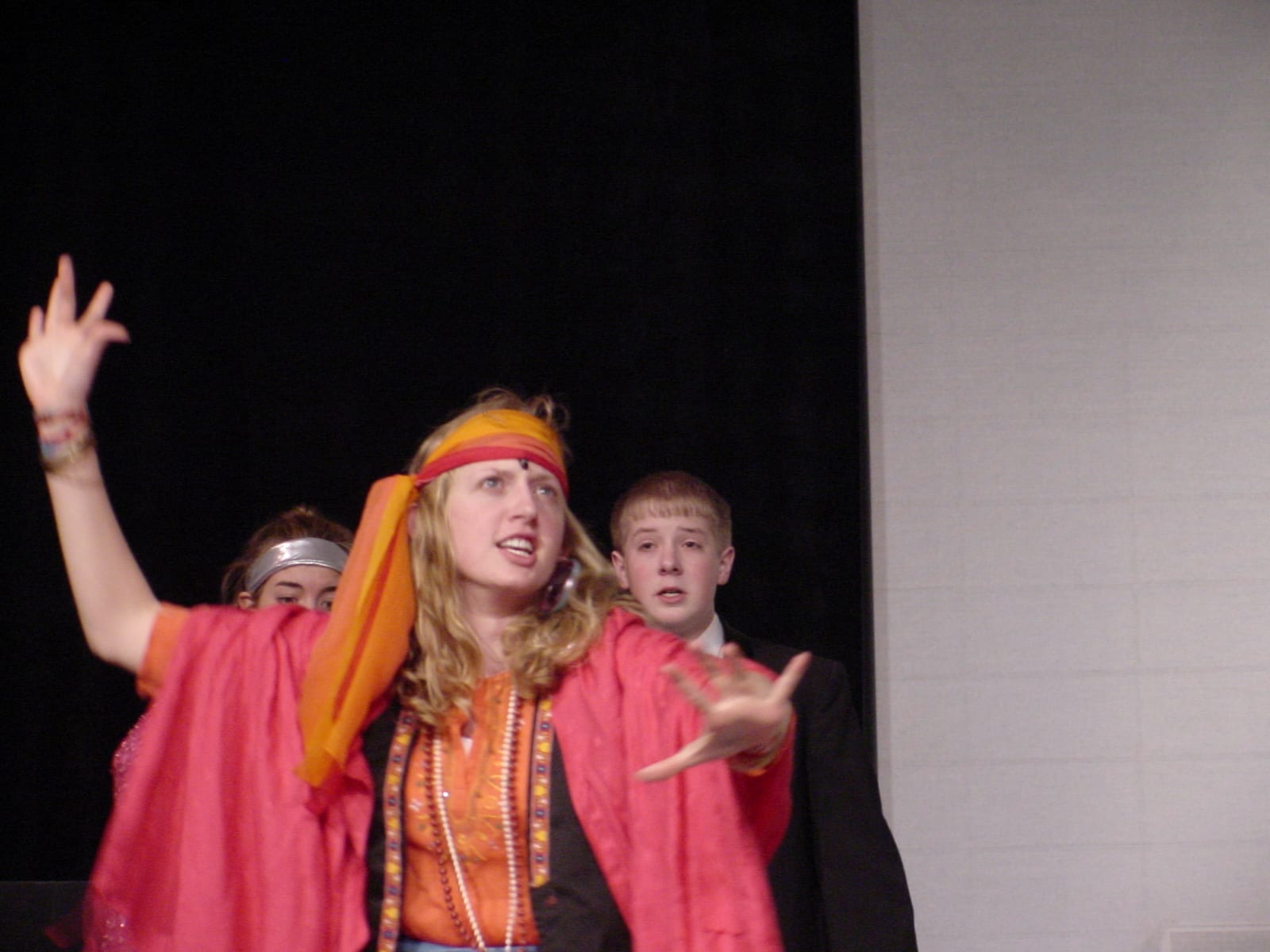 Performer with cast members