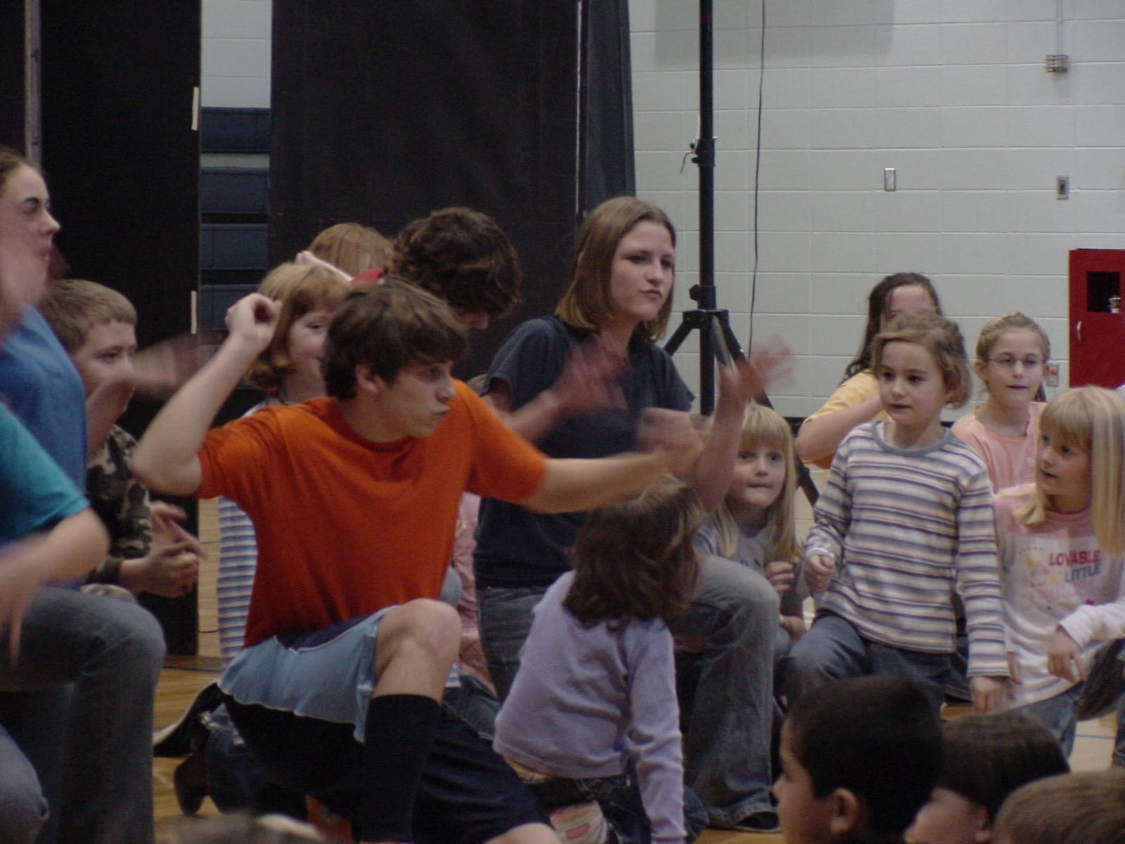 Performers engaging young audience members