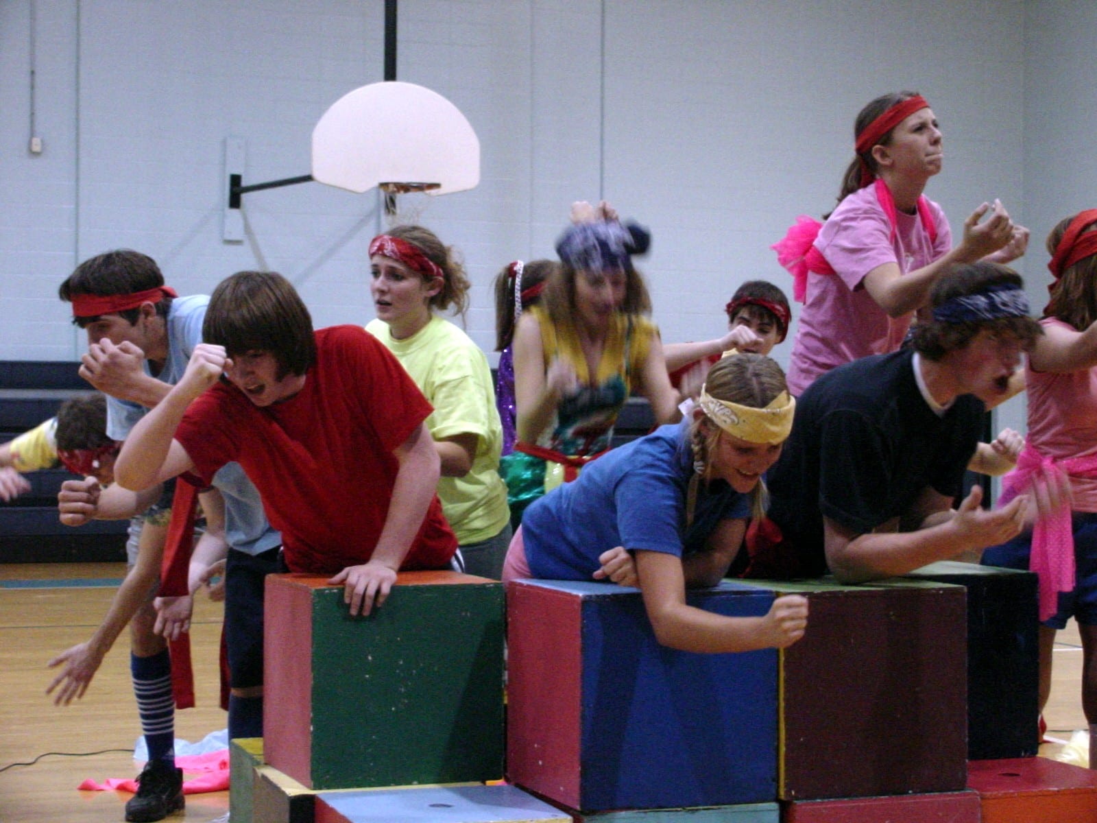 Costumed cast in a stage scene