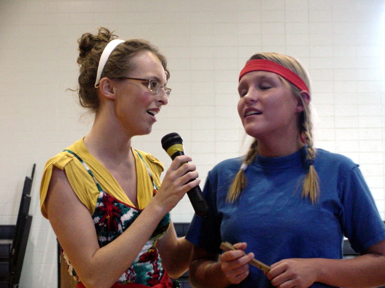 Two performers with a microphone