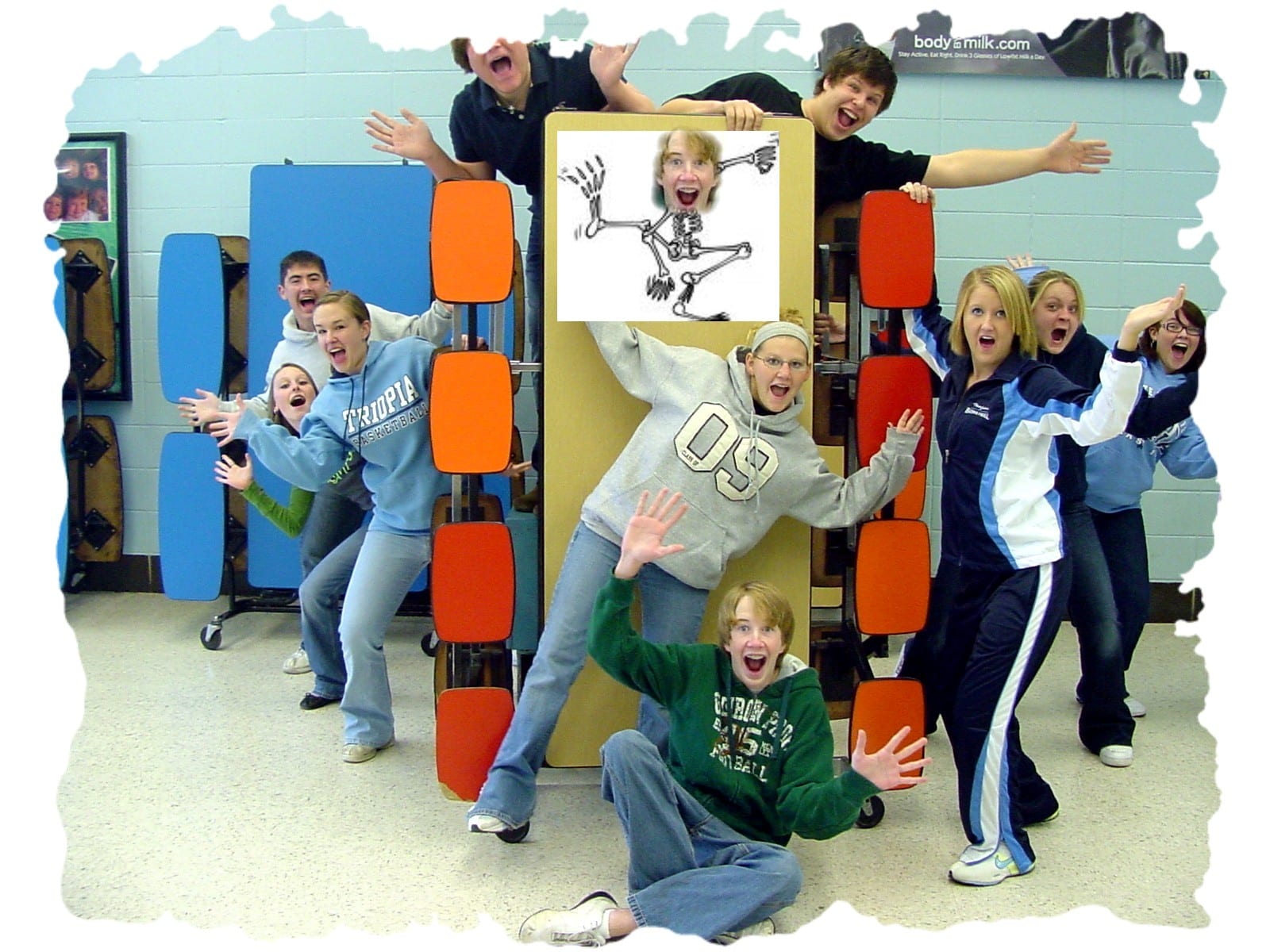 The Triopia cast clowning behind the set