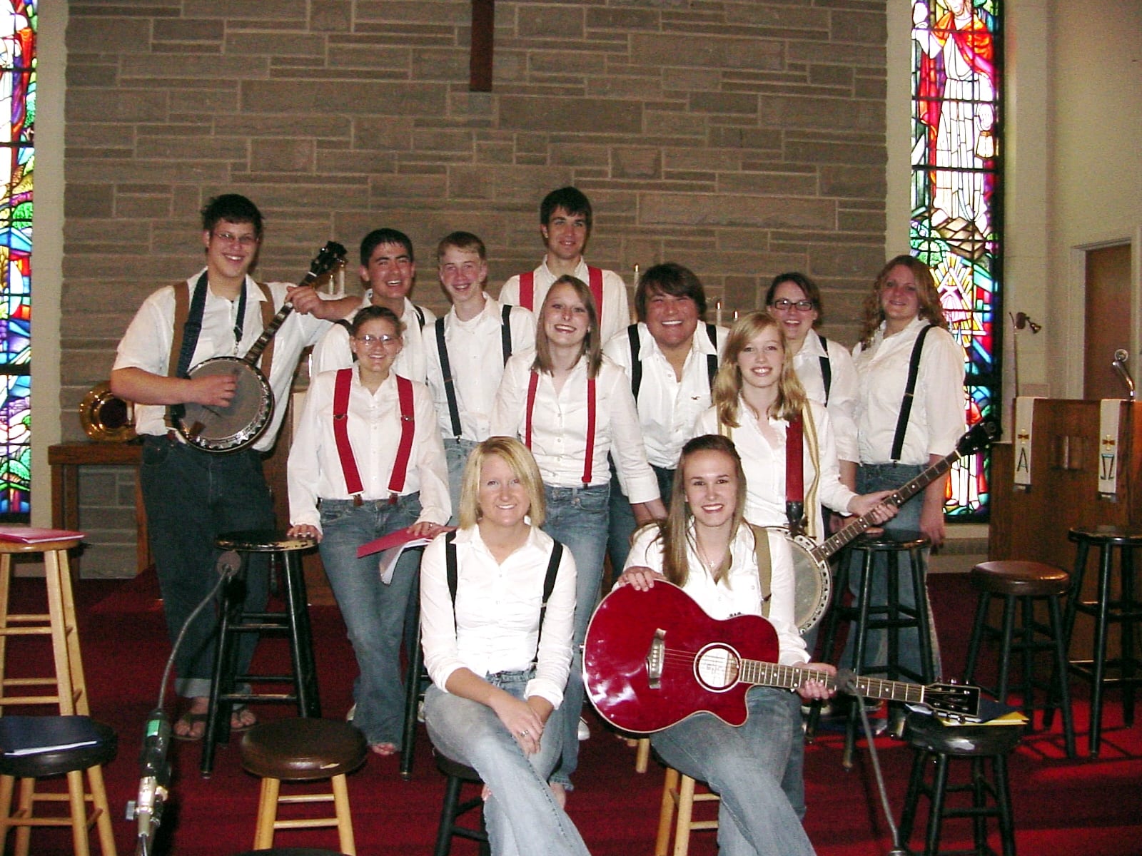 Cast with guitars and banjo before the show