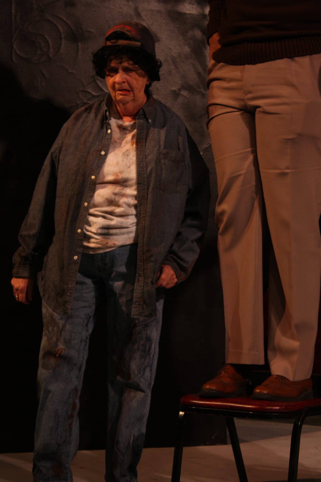 Performer in costume on stage