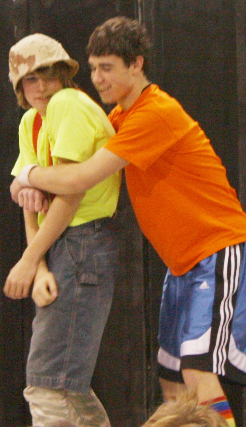 On stage in the gym
