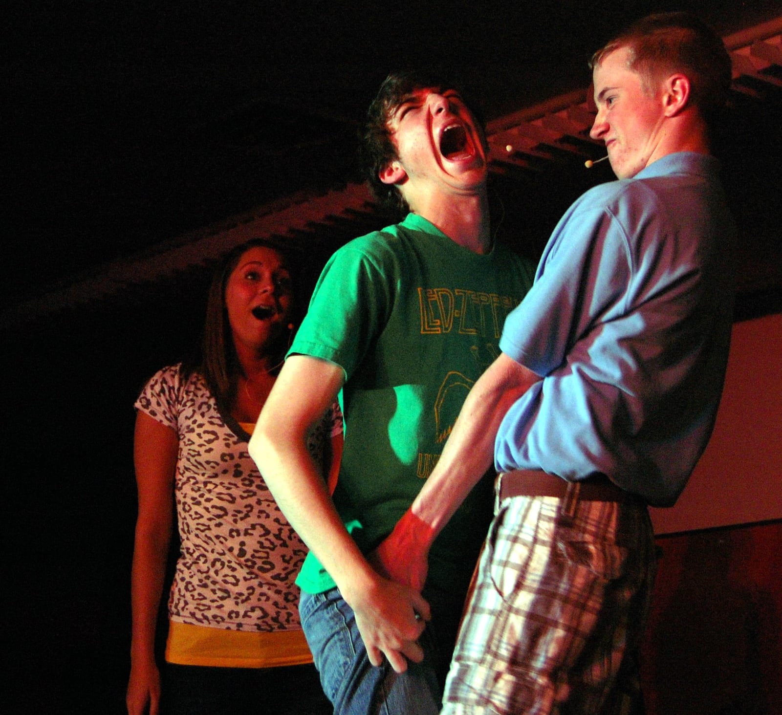Two performers in a dramatic scene