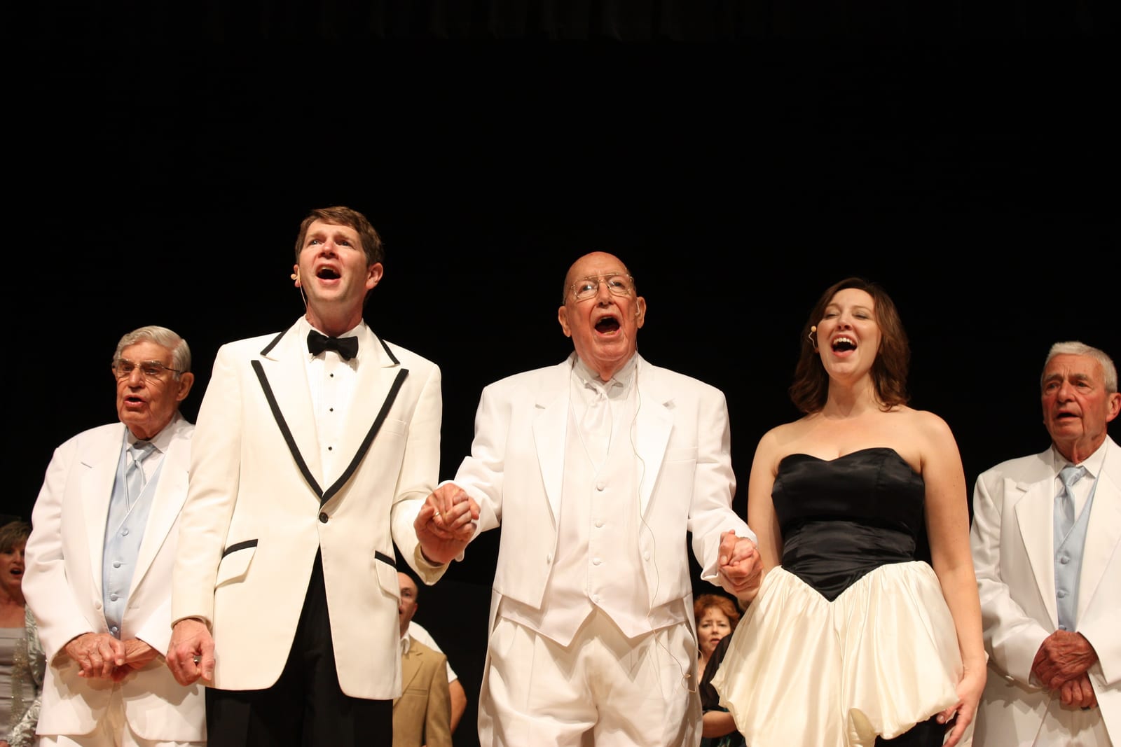 Company finale on stage