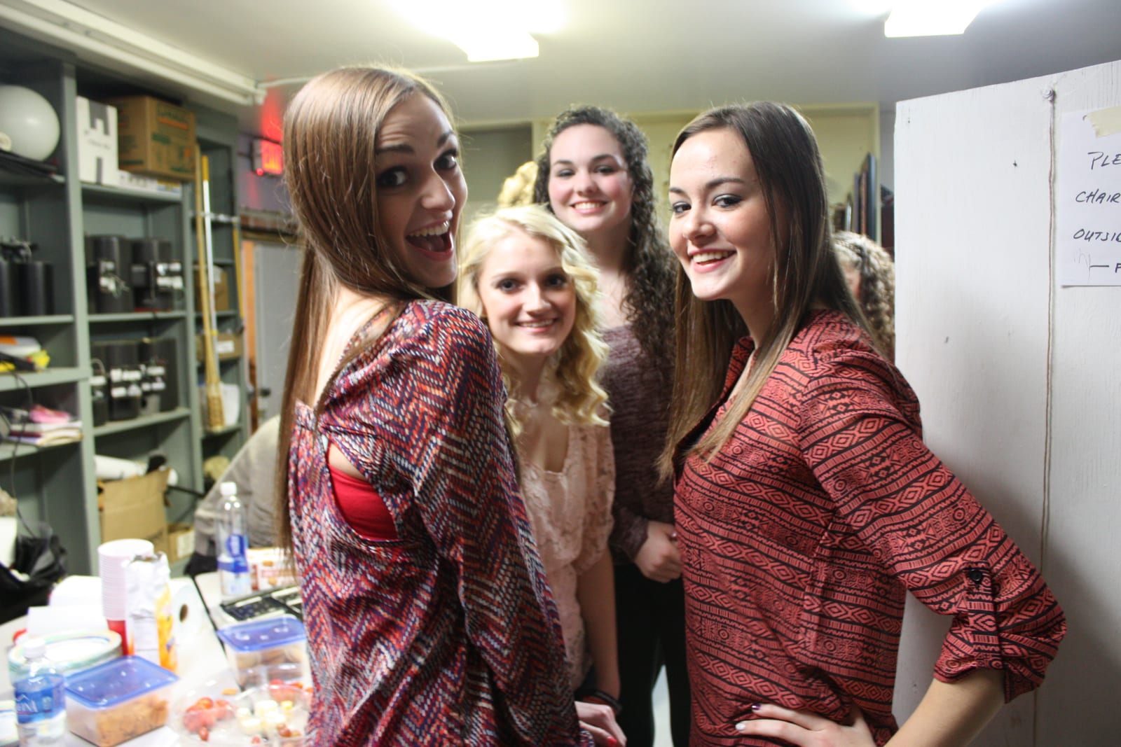 Cast members in matching flannel pajamas