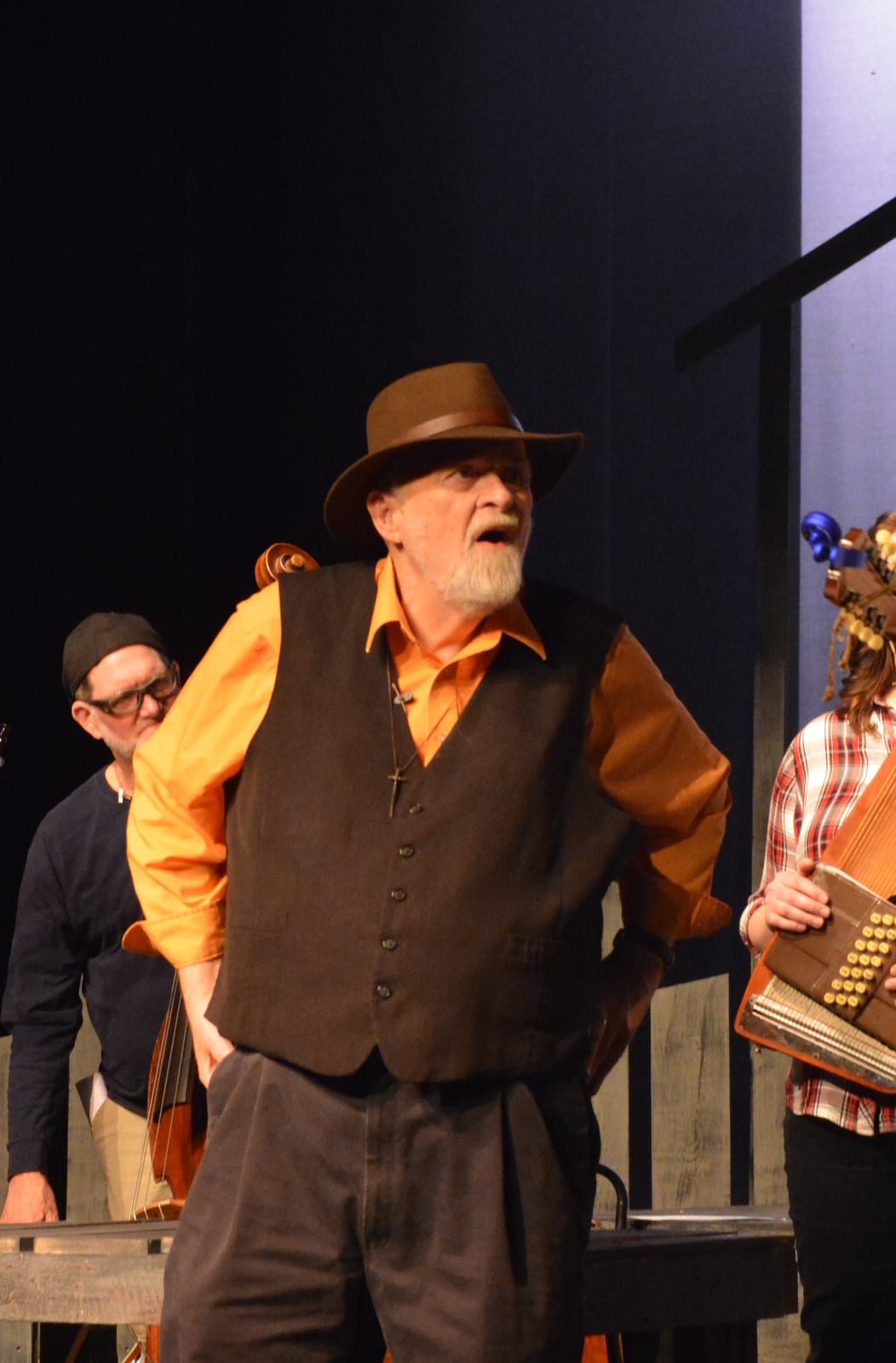 Cast member in character onstage
