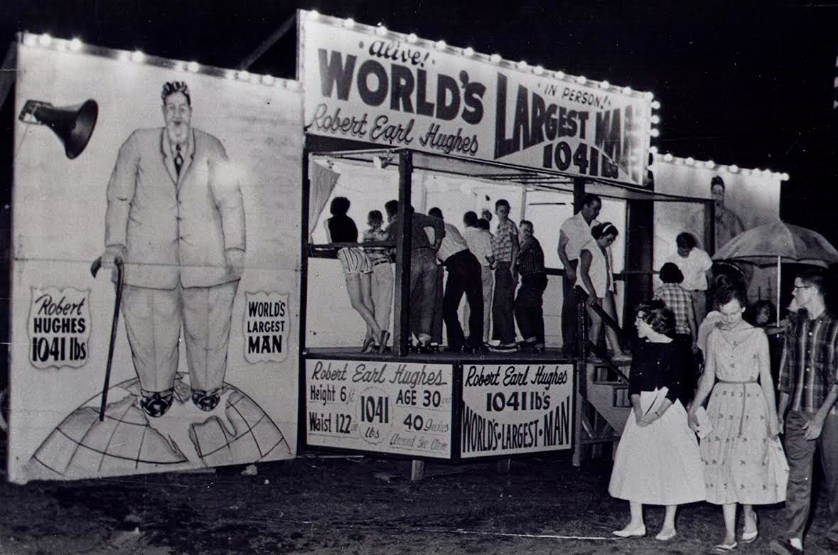 Historical photo of the "World's Largest Man" carnival exhibit for Robert Earl Hughes