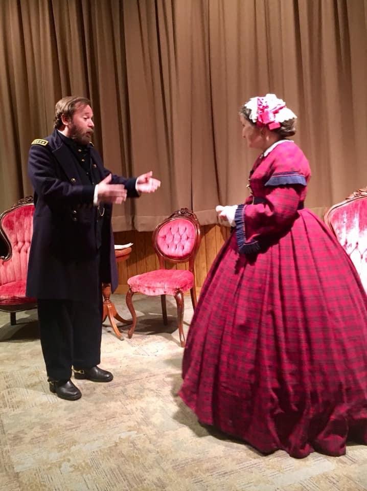 Grant gesturing while speaking with Mary Todd Lincoln