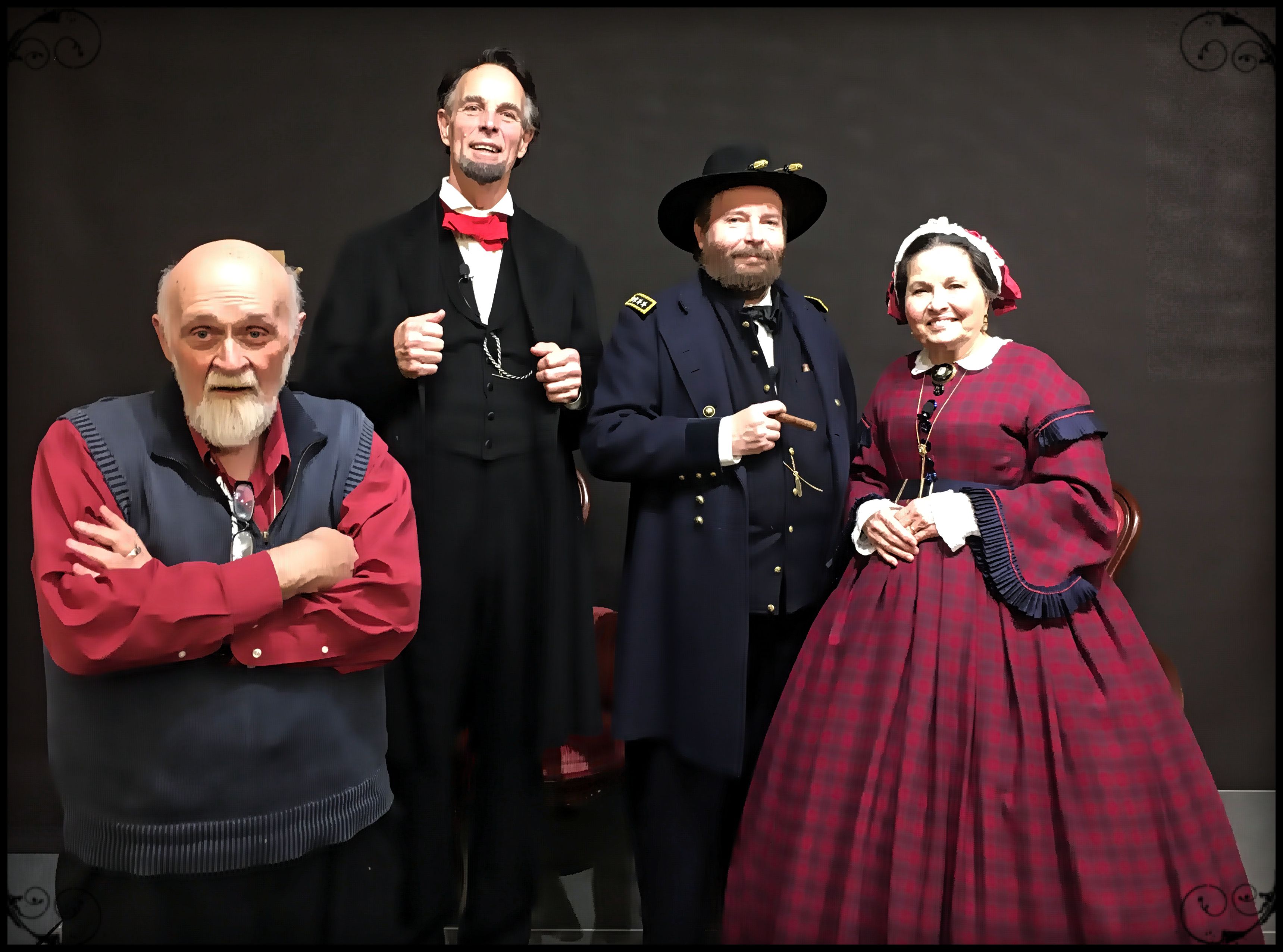 Cast in Civil War-era costume: a Union general as Grant with a cigar, a figure as Abraham Lincoln, and a woman in a tartan hoop dress